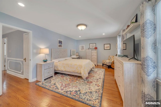 bedroom with light wood-type flooring