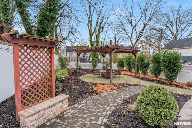 view of yard with a pergola and a patio area