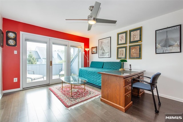 home office featuring french doors, wood-type flooring, and ceiling fan