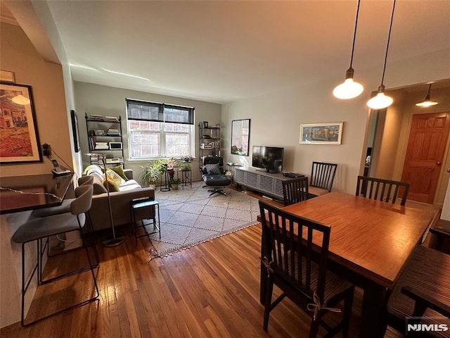 dining room with light wood-type flooring