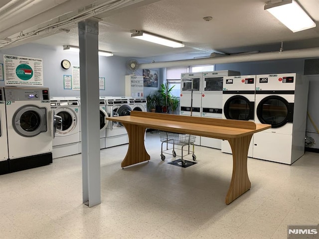 laundry area with washer and dryer and stacked washer and dryer