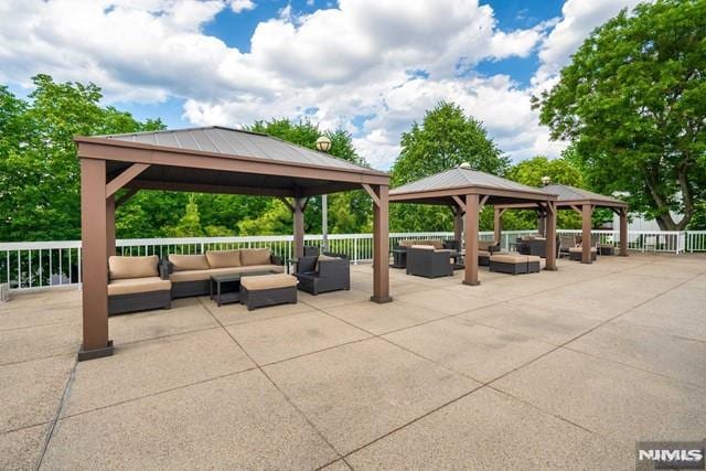 view of patio / terrace with a gazebo and an outdoor hangout area