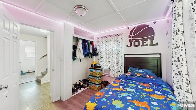 bedroom featuring wood-type flooring