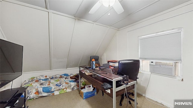 office area with carpet flooring, vaulted ceiling, and ceiling fan