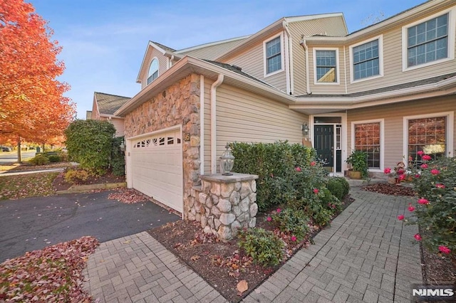 view of home's exterior with a garage