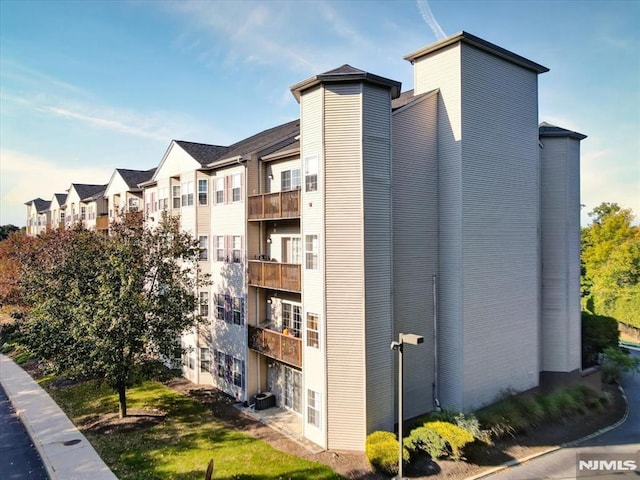 view of property with central AC unit