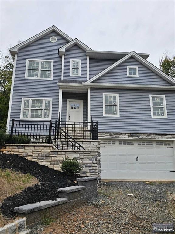 view of front of home with a garage