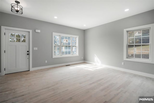 foyer with light wood-type flooring