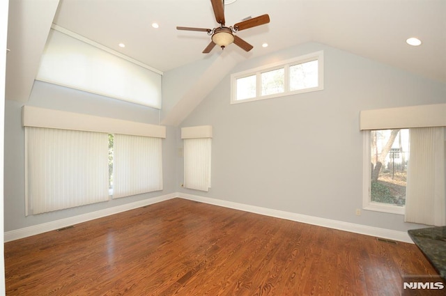 interior space featuring high vaulted ceiling, dark hardwood / wood-style flooring, and ceiling fan