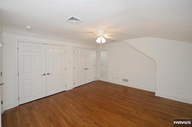 bonus room featuring vaulted ceiling, dark wood-type flooring, and ceiling fan