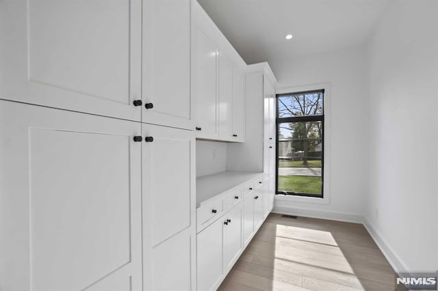 interior space with dark wood-type flooring