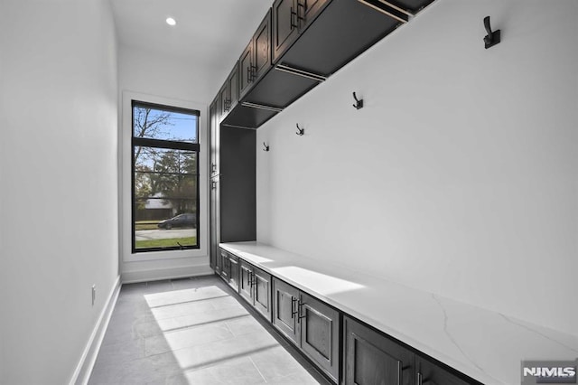 mudroom featuring light tile patterned floors