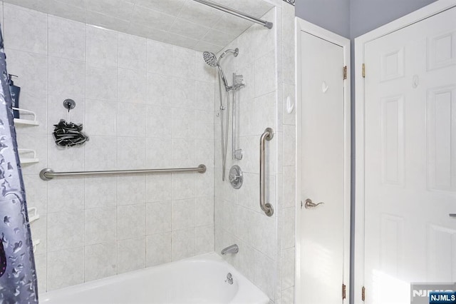 bathroom with shower / bath combination with curtain