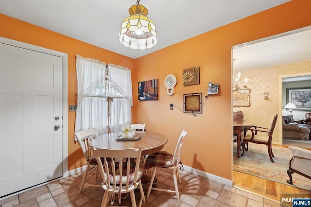 dining space with baseboards