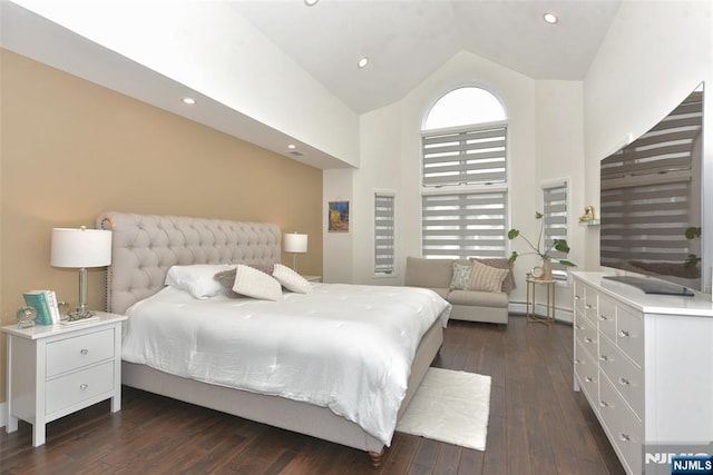 bedroom with high vaulted ceiling, dark wood-type flooring, and recessed lighting