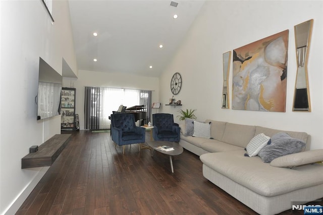 living area featuring high vaulted ceiling, recessed lighting, baseboards, and hardwood / wood-style flooring