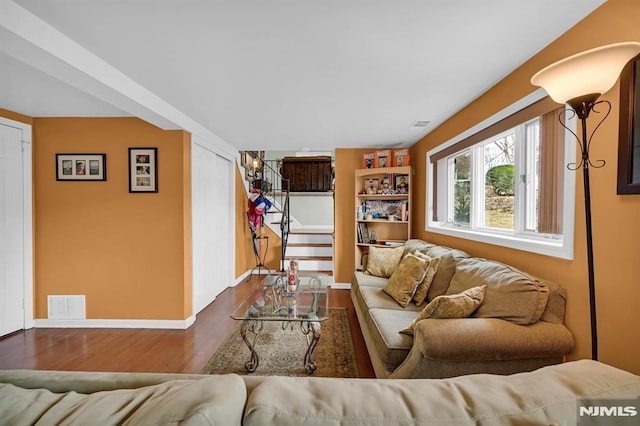 living room with hardwood / wood-style floors