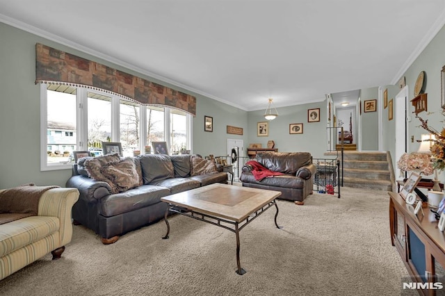 living room with crown molding and light colored carpet