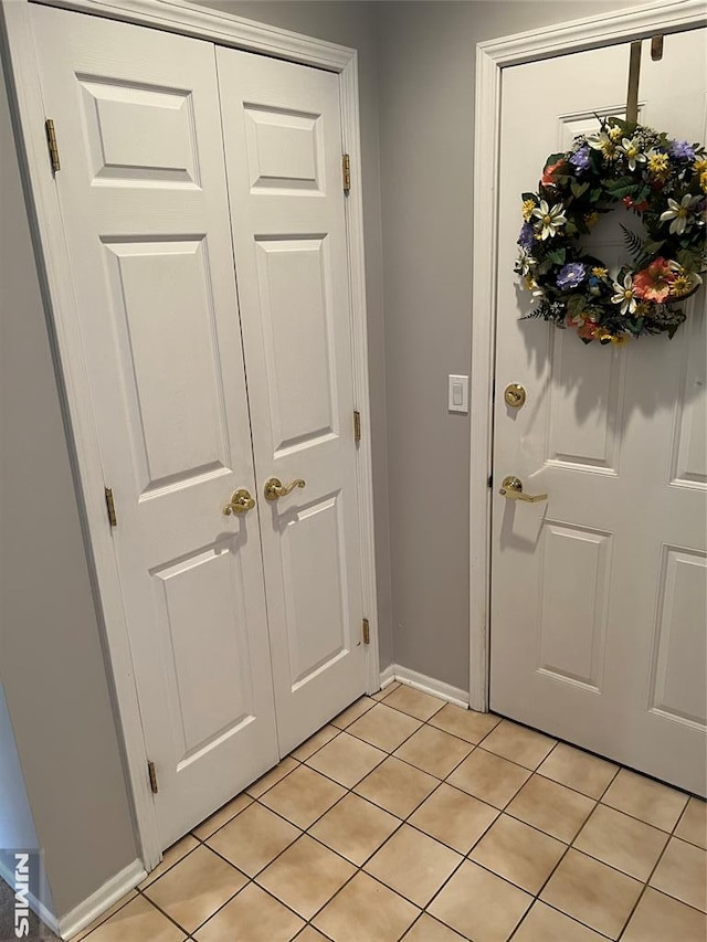 view of tiled foyer entrance