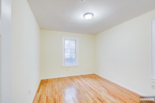 empty room featuring light hardwood / wood-style floors