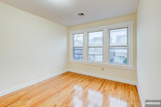 empty room featuring light hardwood / wood-style floors