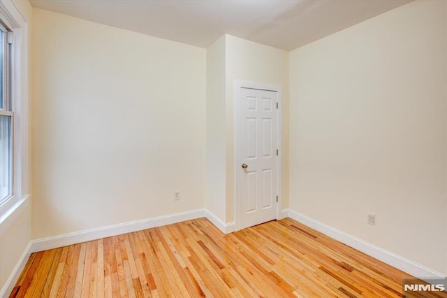 empty room featuring hardwood / wood-style floors