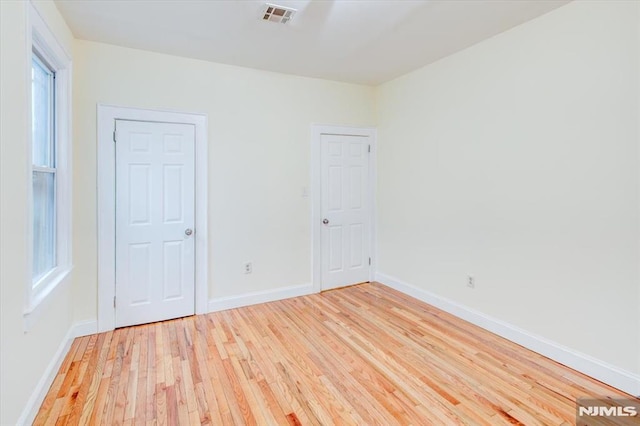 empty room featuring light hardwood / wood-style flooring