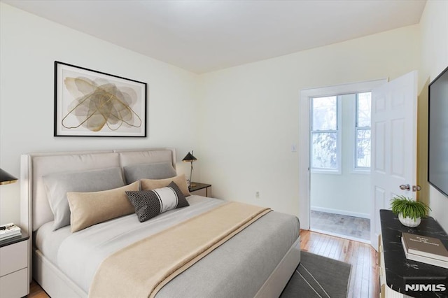 bedroom featuring light wood-type flooring