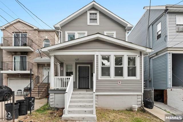 multi unit property featuring covered porch