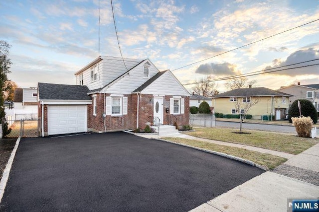 view of front of property with a garage