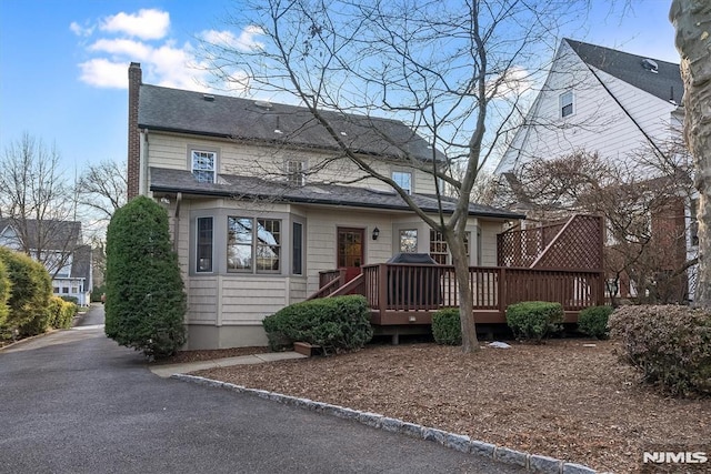 view of front of house featuring a deck