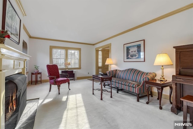 carpeted living room with crown molding