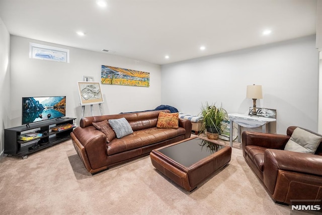 living room featuring light carpet