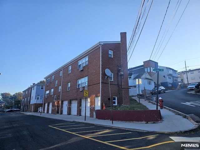 view of building exterior with a garage