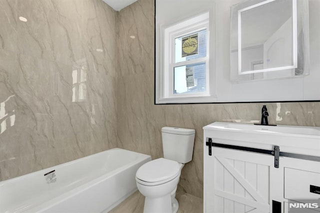 full bathroom featuring tile walls, toilet, vanity, and  shower combination