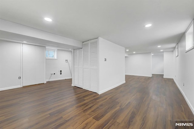 basement featuring dark wood-type flooring