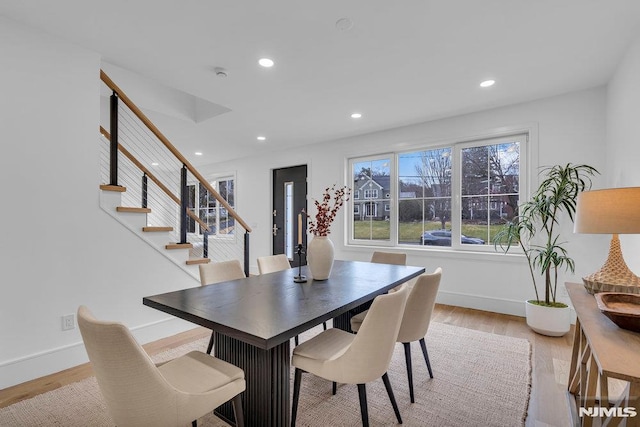 dining room with light wood-type flooring