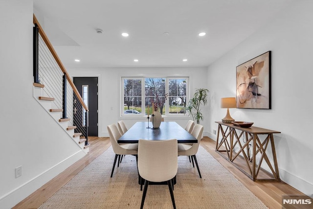 dining room with light hardwood / wood-style flooring