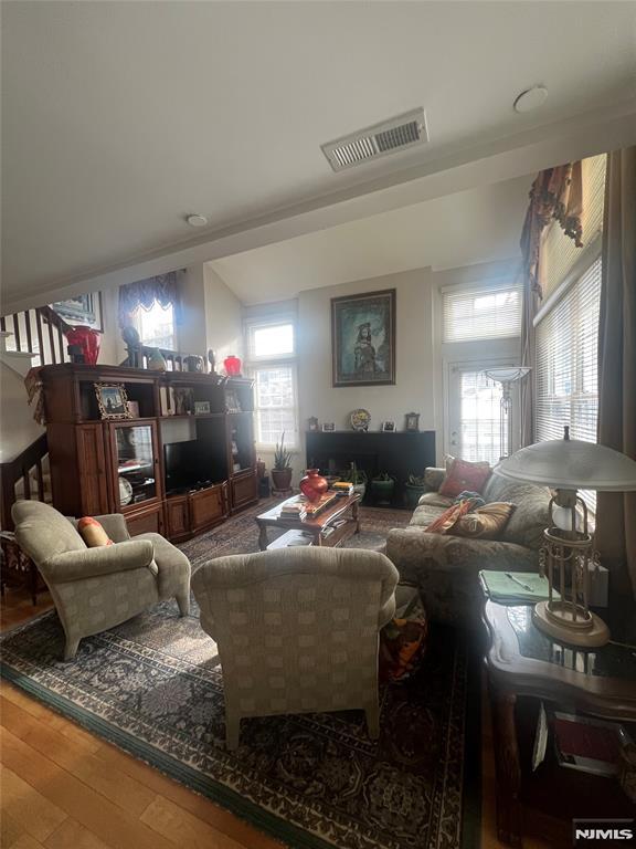 living room with hardwood / wood-style floors