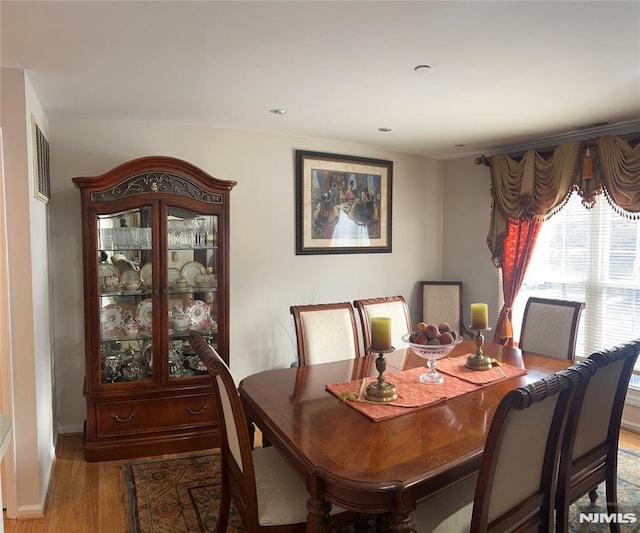 dining area with light wood-type flooring