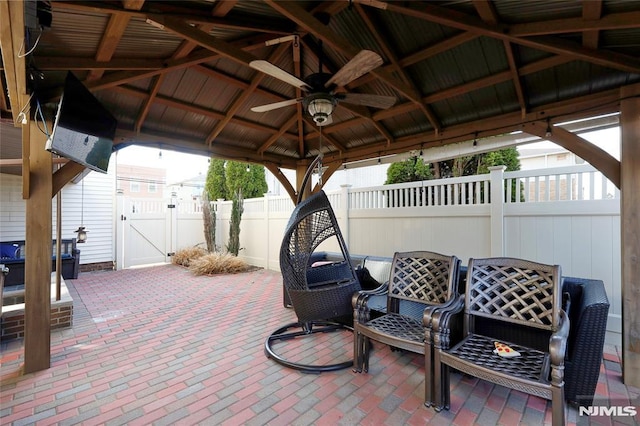 view of patio featuring a gazebo and ceiling fan