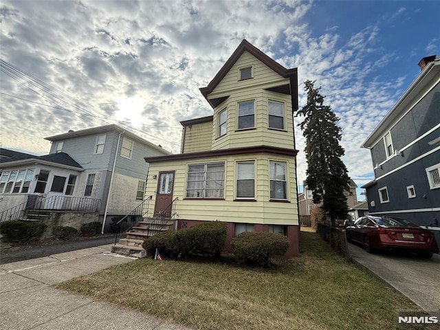 view of front of house with a front yard