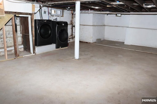 basement with separate washer and dryer