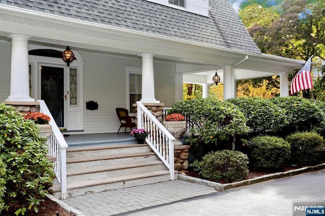 entrance to property with covered porch