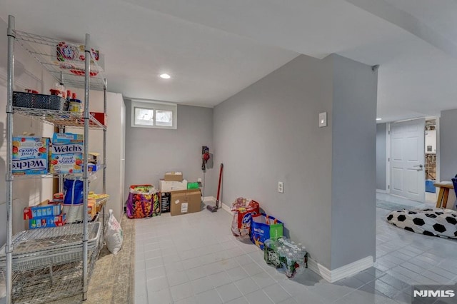 game room featuring tile patterned flooring