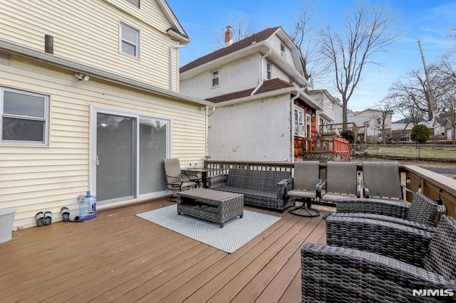 deck featuring an outdoor hangout area