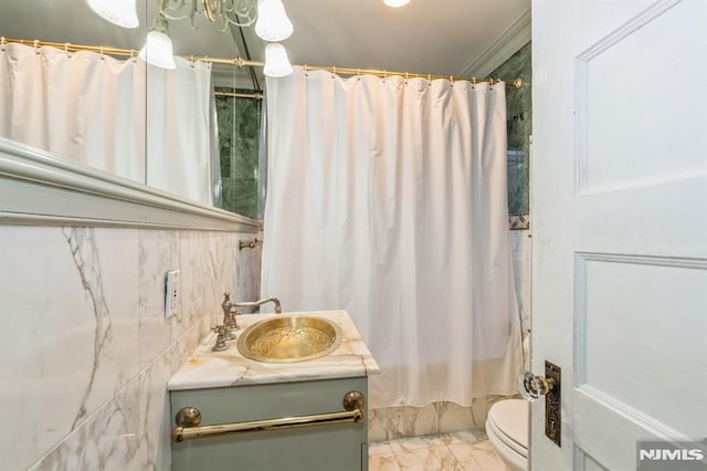 full bathroom featuring vanity, toilet, and shower / bath combo with shower curtain