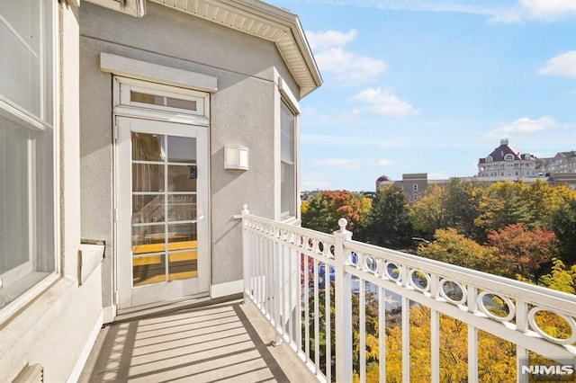 balcony featuring a baseboard heating unit