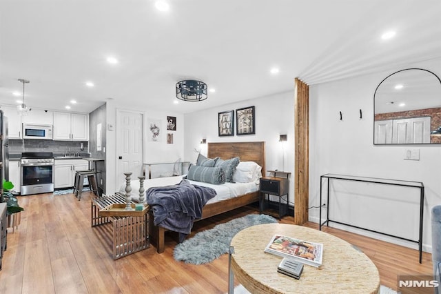 bedroom featuring light hardwood / wood-style flooring