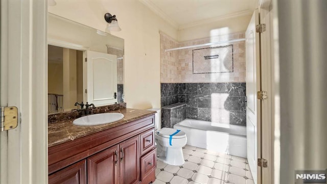 bathroom featuring crown molding, vanity, and toilet